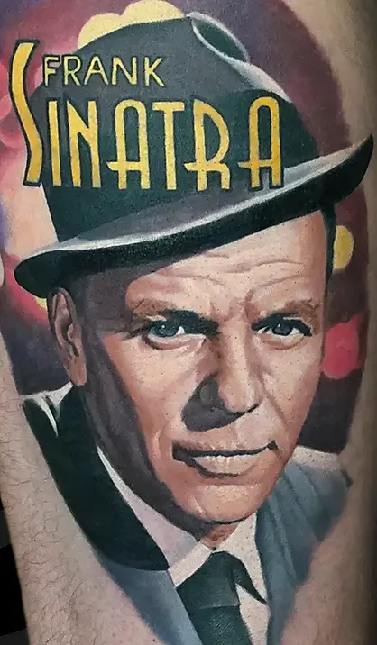 Color Realism thigh tattoo of Frank sinatra by Serjo bronfman at Serjo Tattoo Tel-aviv.