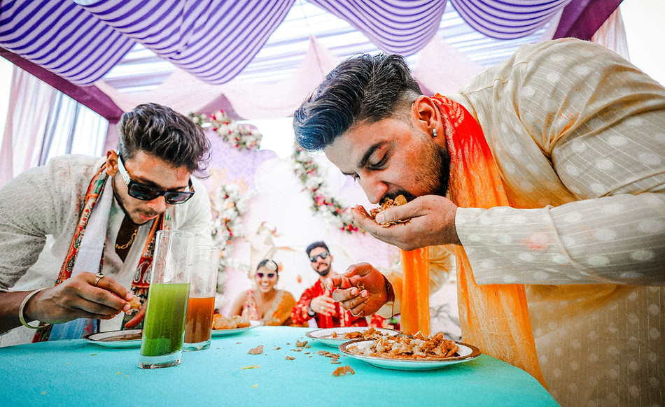 Loved ones participating in playful wedding activities during cheerful family celebrations