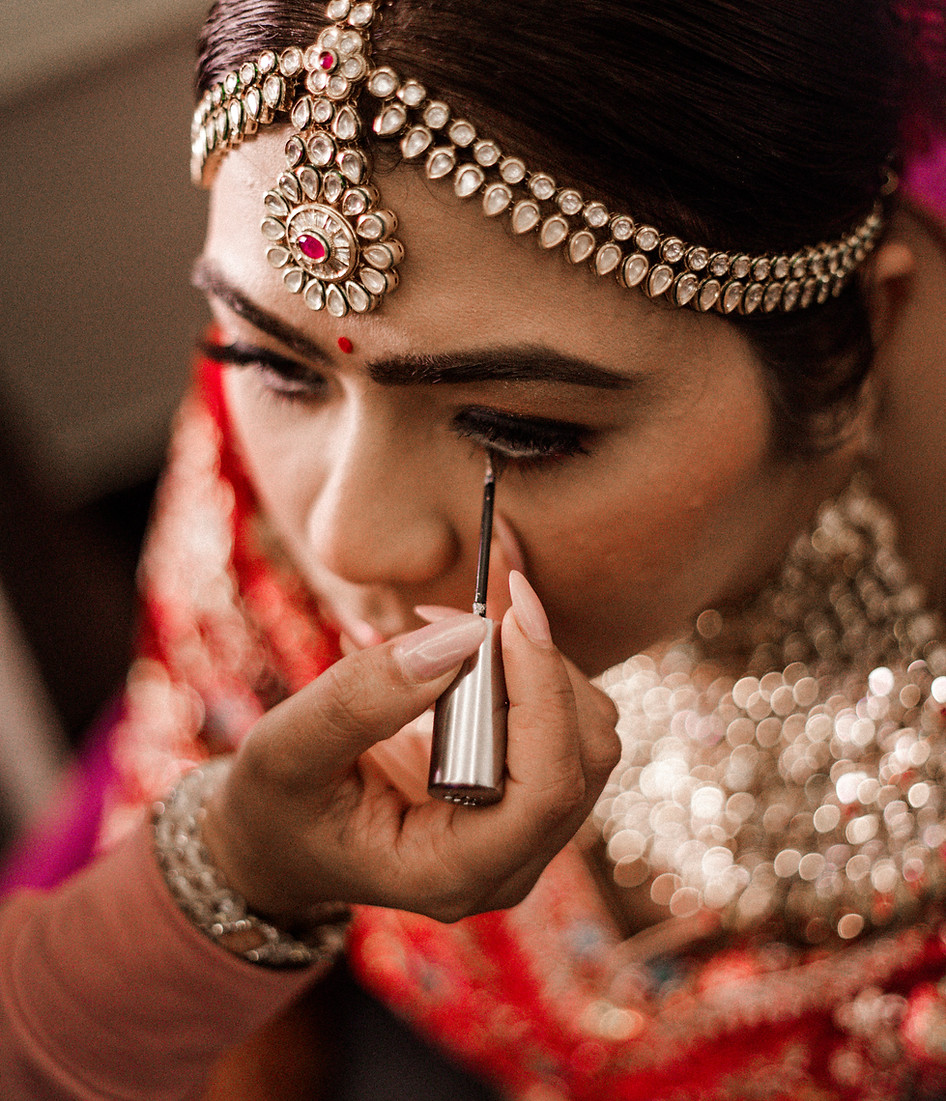 A stunning bridal portrait emphasizing her makeup artistry.