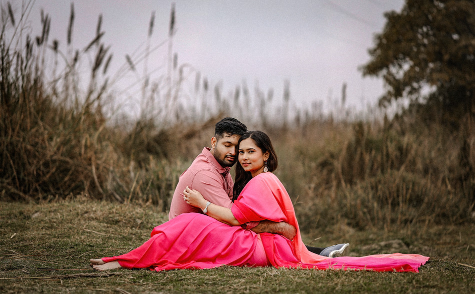 Dreamy pre-wedding portrait captured in the riverside meadows of Delhi