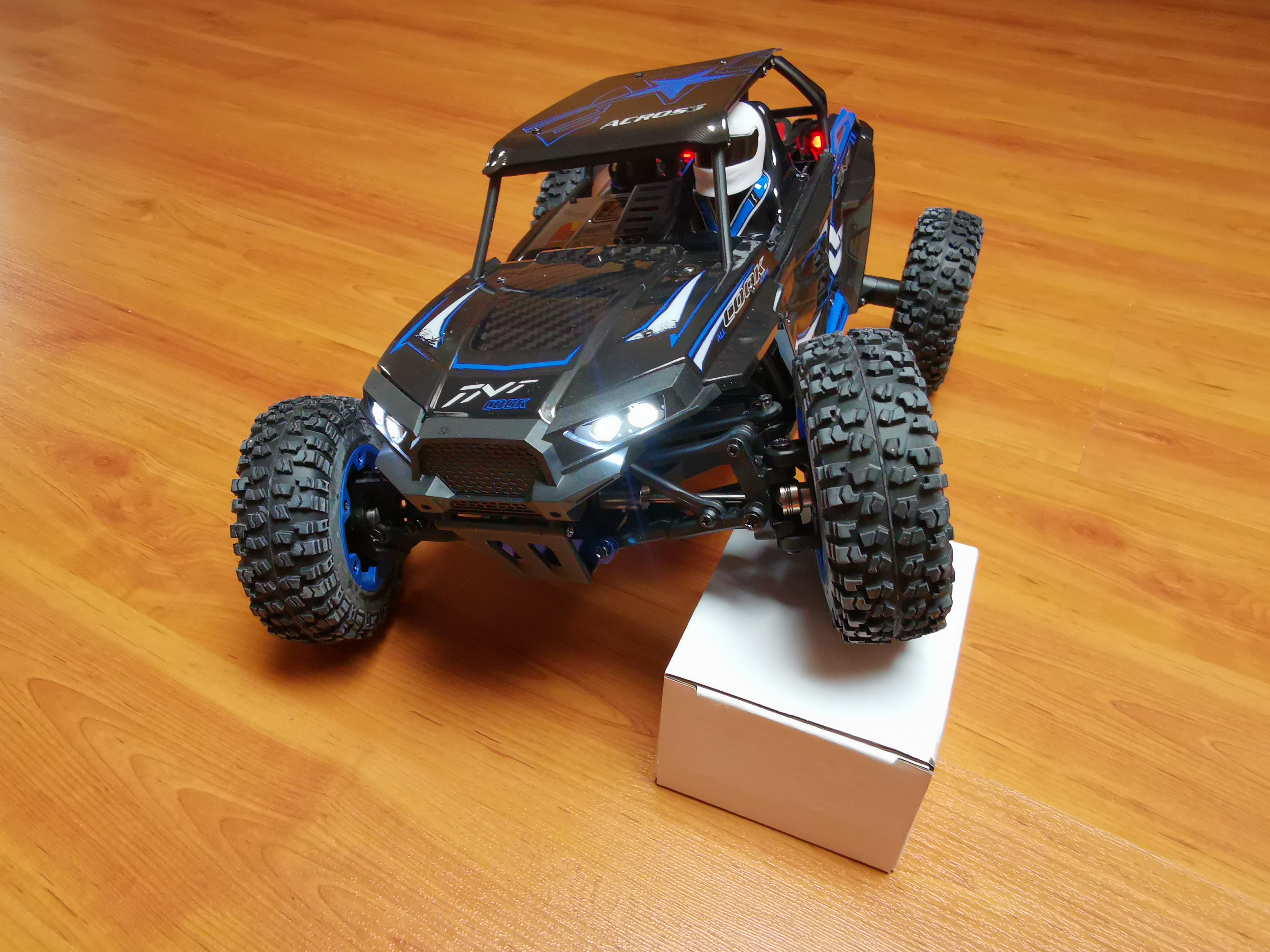 Carro elétrico 1:12 WLToys 12428-B Pro tipo Crawler