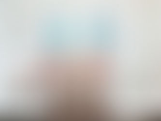 a child's bedroom with two colorful beds