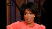Photo of Oprah Winfrey having one of her famous "AH HA" moments.