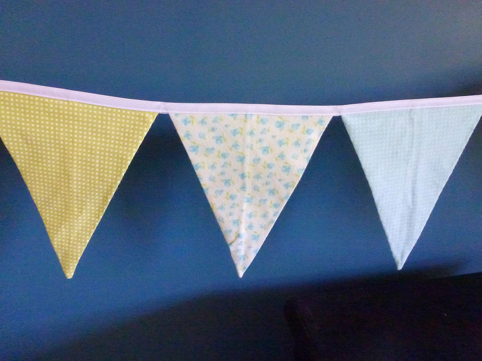 Thumbnail: Pale yellow/green/blue bunting in soft flannel fabric