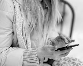 woman on phone - Can Social Media Be Used as Evidence in El Paso County, Colorado Court?