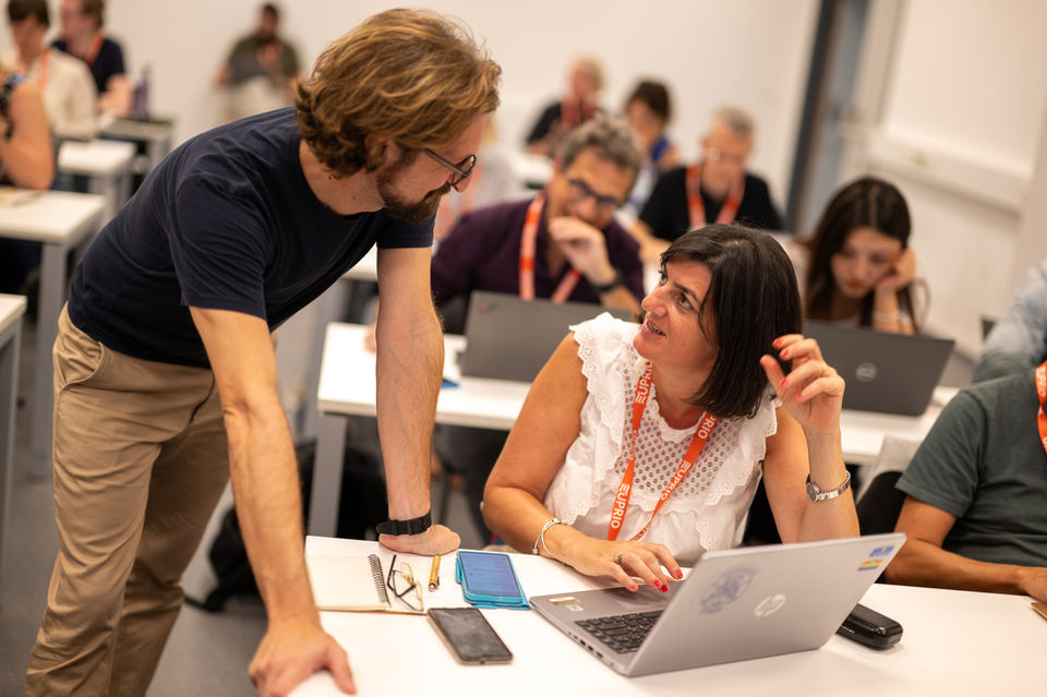 Workshop participant receiving guidance during science communication training