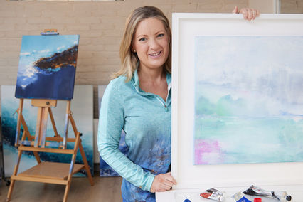 Sue Nelson, Irish artist and photographer, in a candid moment that reflects her creative process and natural inspiration.