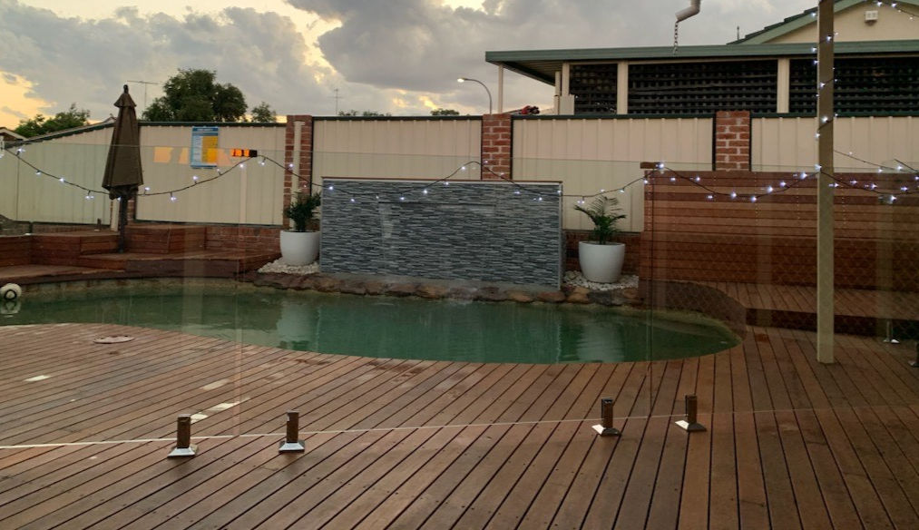 Hardwood decking around pool 