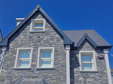 Workers finishing a new house