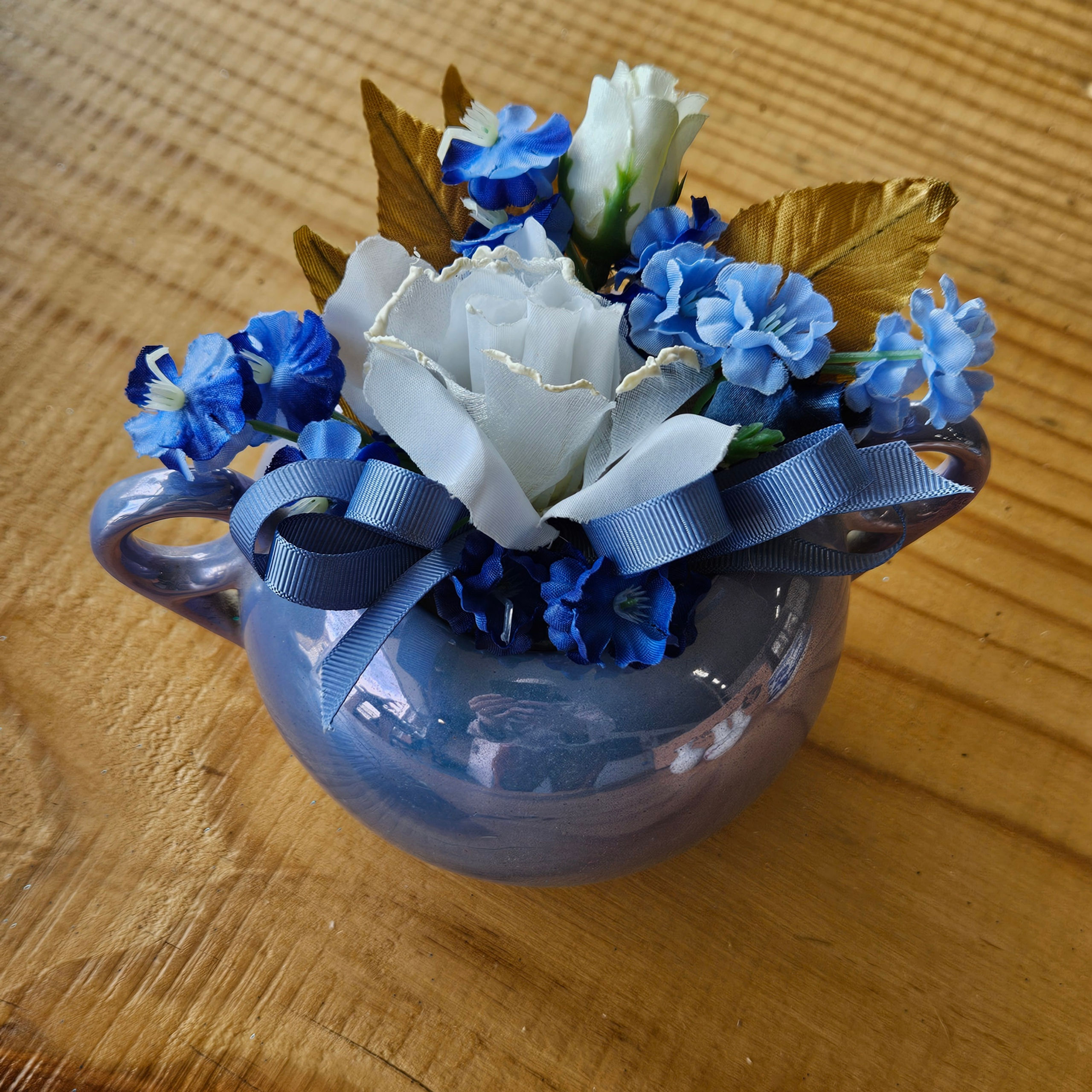 Blue pot with silk flowers
