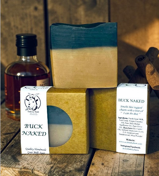 Goat Milk Soap called Buck Naked showcasing the natural and dark color layers and packaging