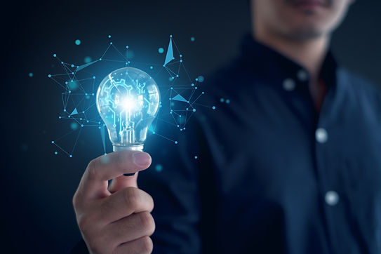 Idea innovation and inspiration concept.Hand of man holding illuminated light bulb, Idea i