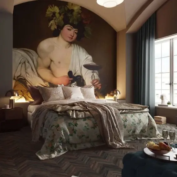 Slaapkamer met monumentale muurschildering achter het bed, waarin beeld en persoonlijke expressie de ruimte bepalen.