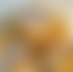 innovative cinnamon roll made with phyllo dough instead of traditional dough all stacked on a white plate oozing with sticky cinnamon insides