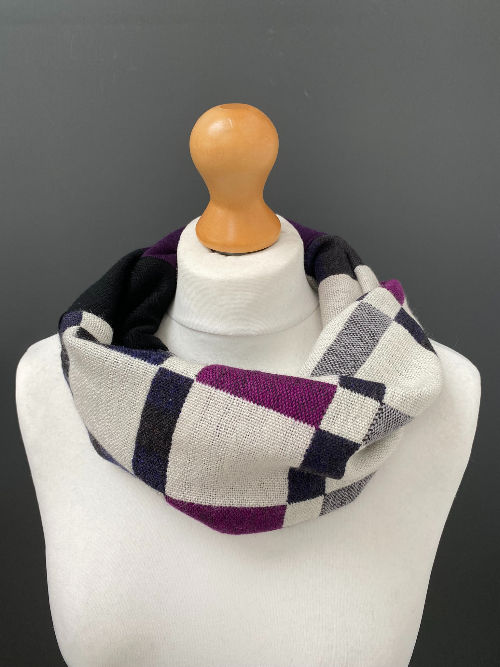 Thumbnail: white, pink, purple, and black handwoven geometric cowl snood scarf