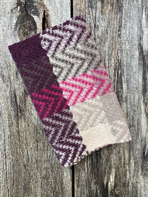 Thumbnail: Handwoven pink and burgundy zig-zag merino snood — 30cm × 72cm, showing full colour distribution of deflected doubleweave