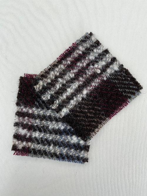 Thumbnail: two handwoven woollen wool coasters in autumnal burgundy, green, grey and natural shades with hand spun yarn