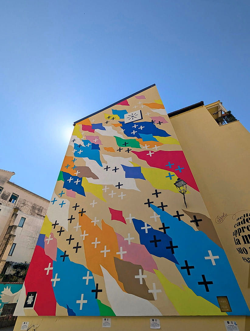 Large-scale mural by UNO titled 'To See The Stars Again'. A massive 145sqm urban intervention in Salerno's Fornelle district.
