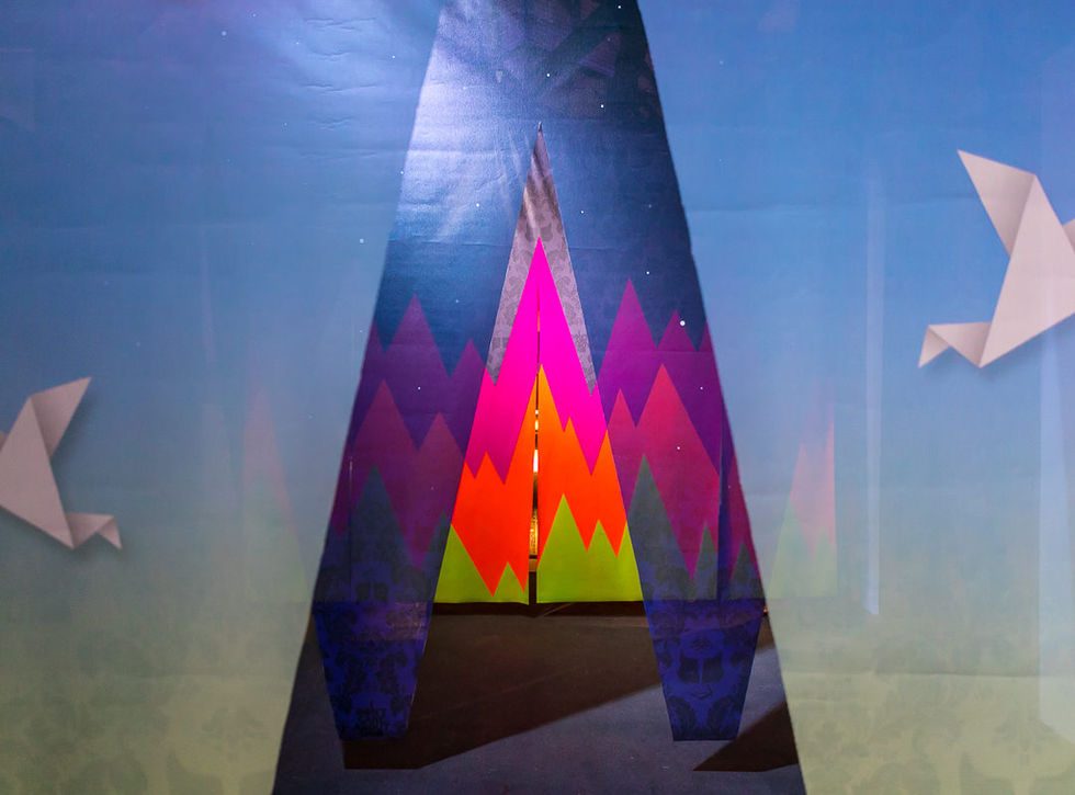 UNO's /OUTSIDE IN installation: five geometric fluorescent stages acting as a threshold at Outdoor Festival 2018, Rome.