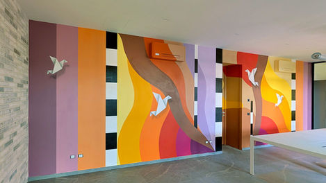 Colorful mural with natural and abstract elements, painted near Parma, Italy