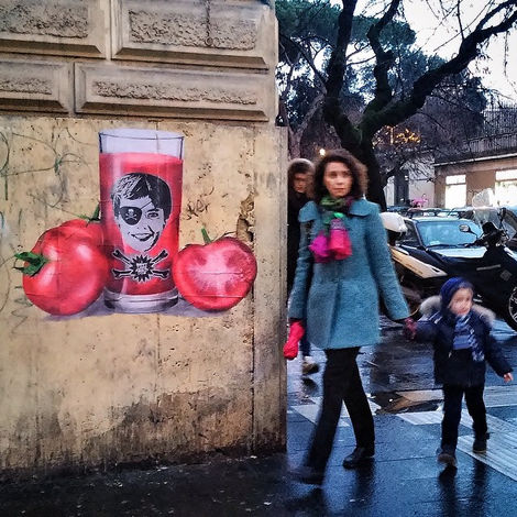 Urban art in San Lorenzo: UNO's intervention in Rome's historic district, paste-up technique.