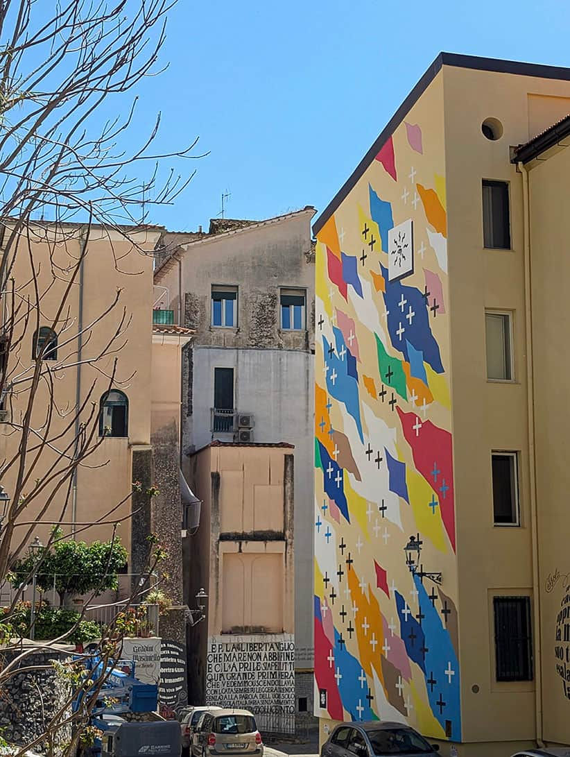 Large-scale mural by UNO titled 'To See The Stars Again'. A massive 145sqm urban intervention in Salerno's Fornelle district.
