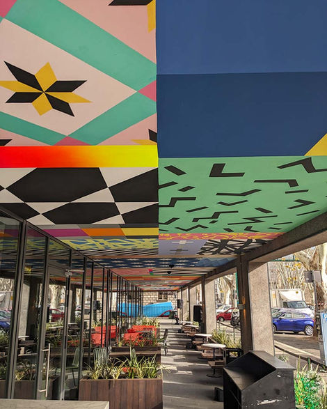 LOOK UP – Hand-painted ceiling installation at CitizenM, Isola Tiberina, Rome, 2023, with technicolor pixels and patchwork