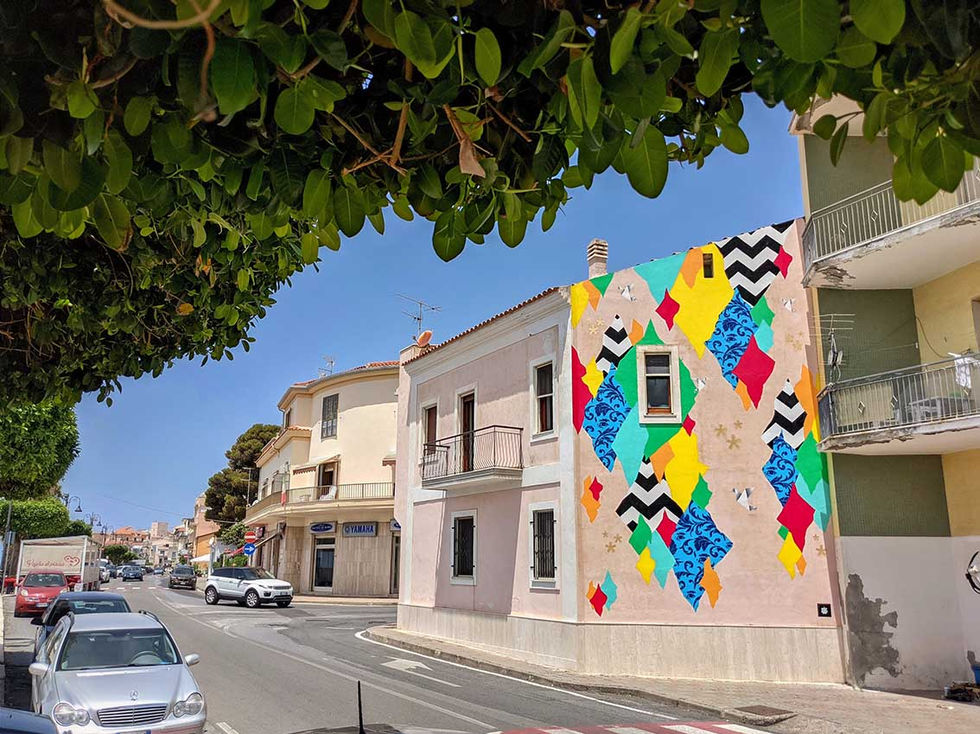 Large-scale mural in Diamante with torn shapes, bold patterns, golden asterisks, and origami birds. Camouflage 87023.