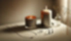DALL·E 2024-10-10 16.01.15 - A simple and elegant composition featuring a lit candle besid