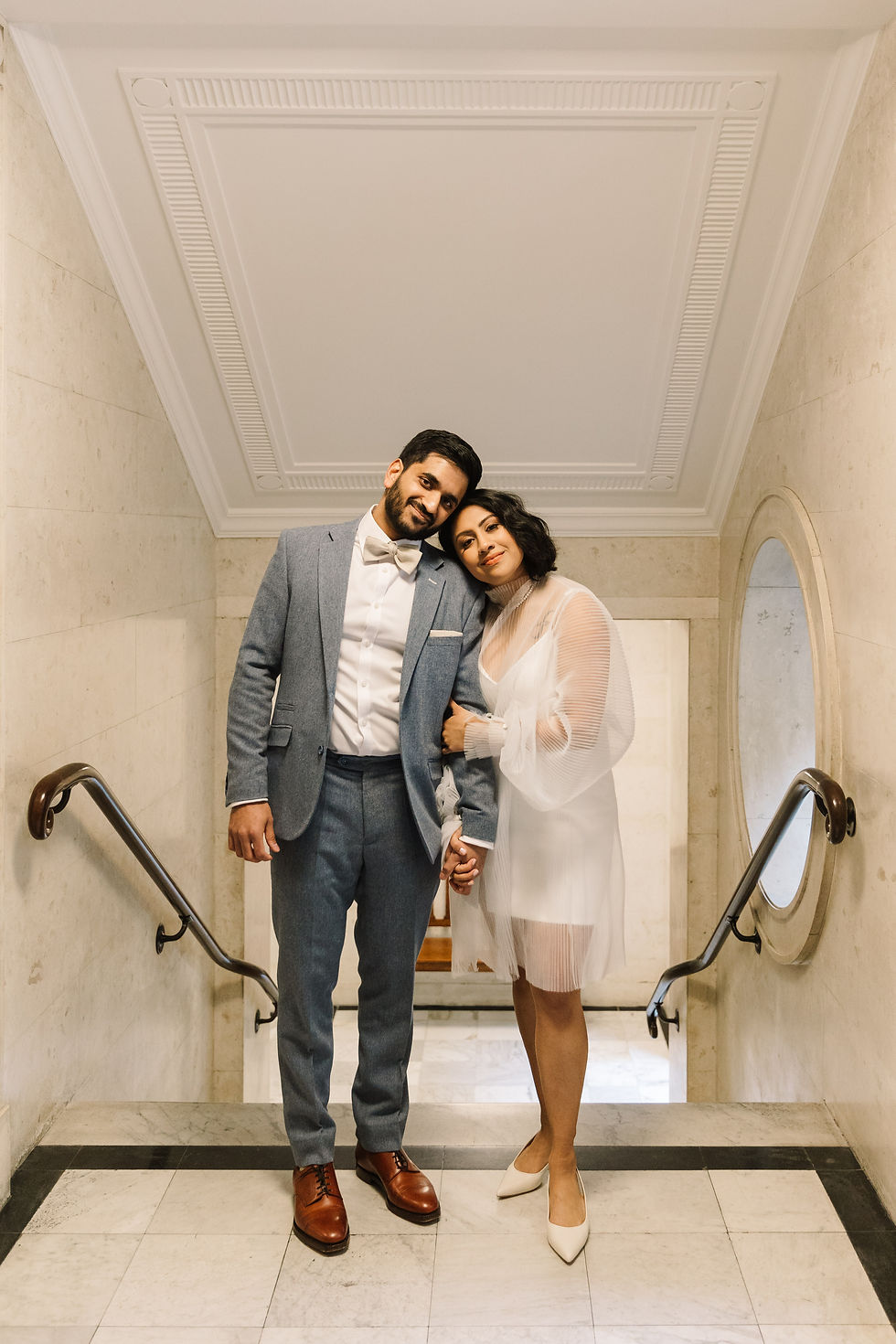 bride and groom inside town hall