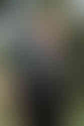 two men hugging at wedding