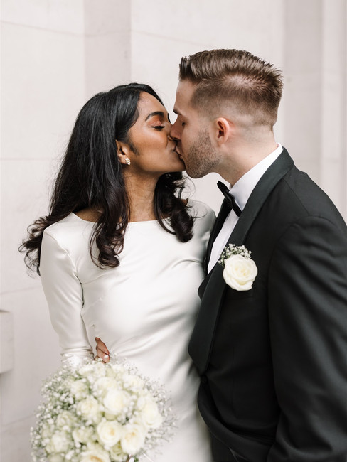 bride and groom kissing