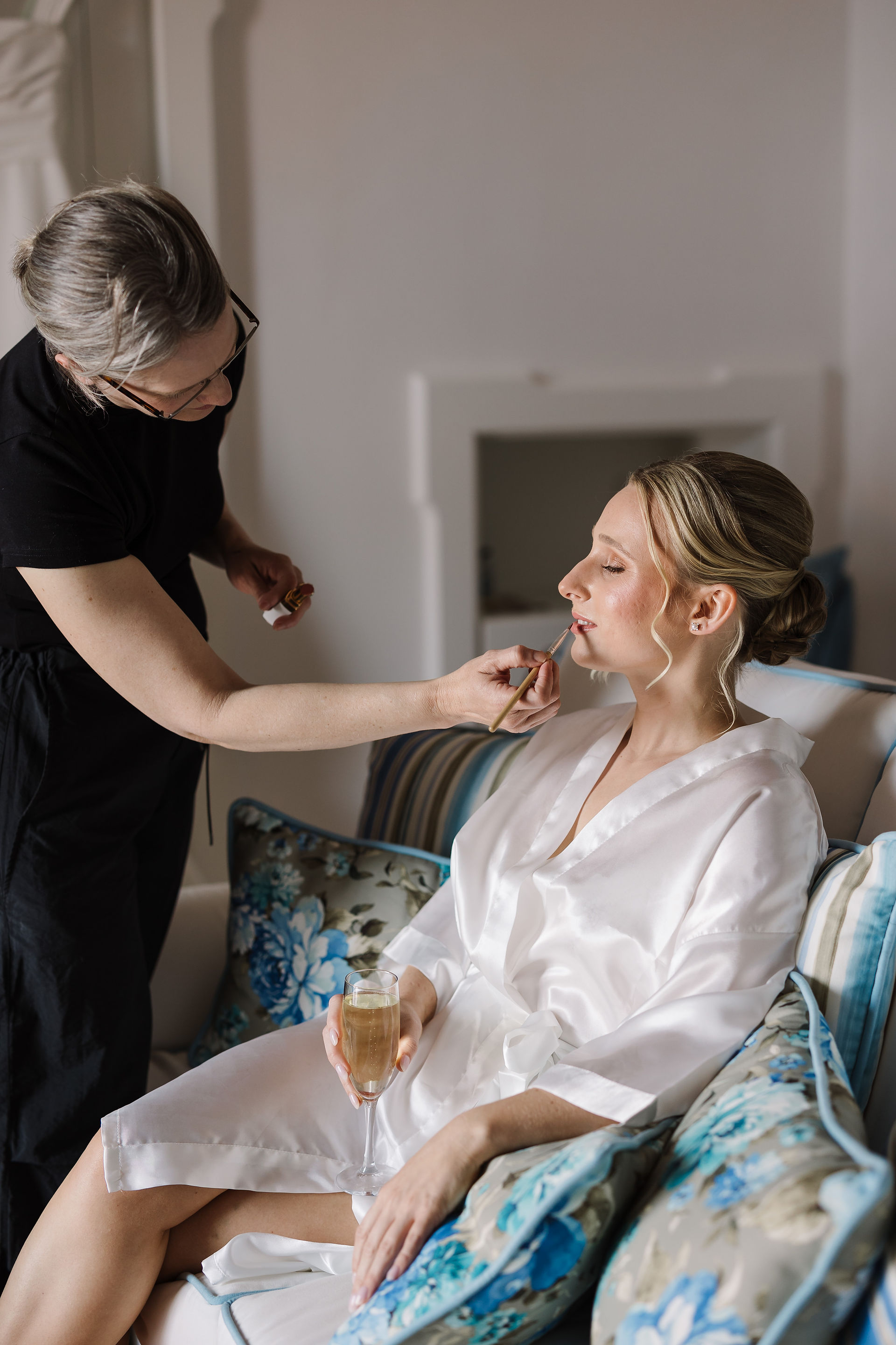 bride having make up done