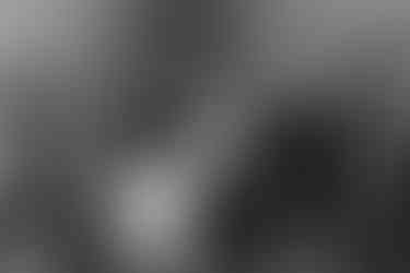 bride and groom dancing in marquee at garden wedding