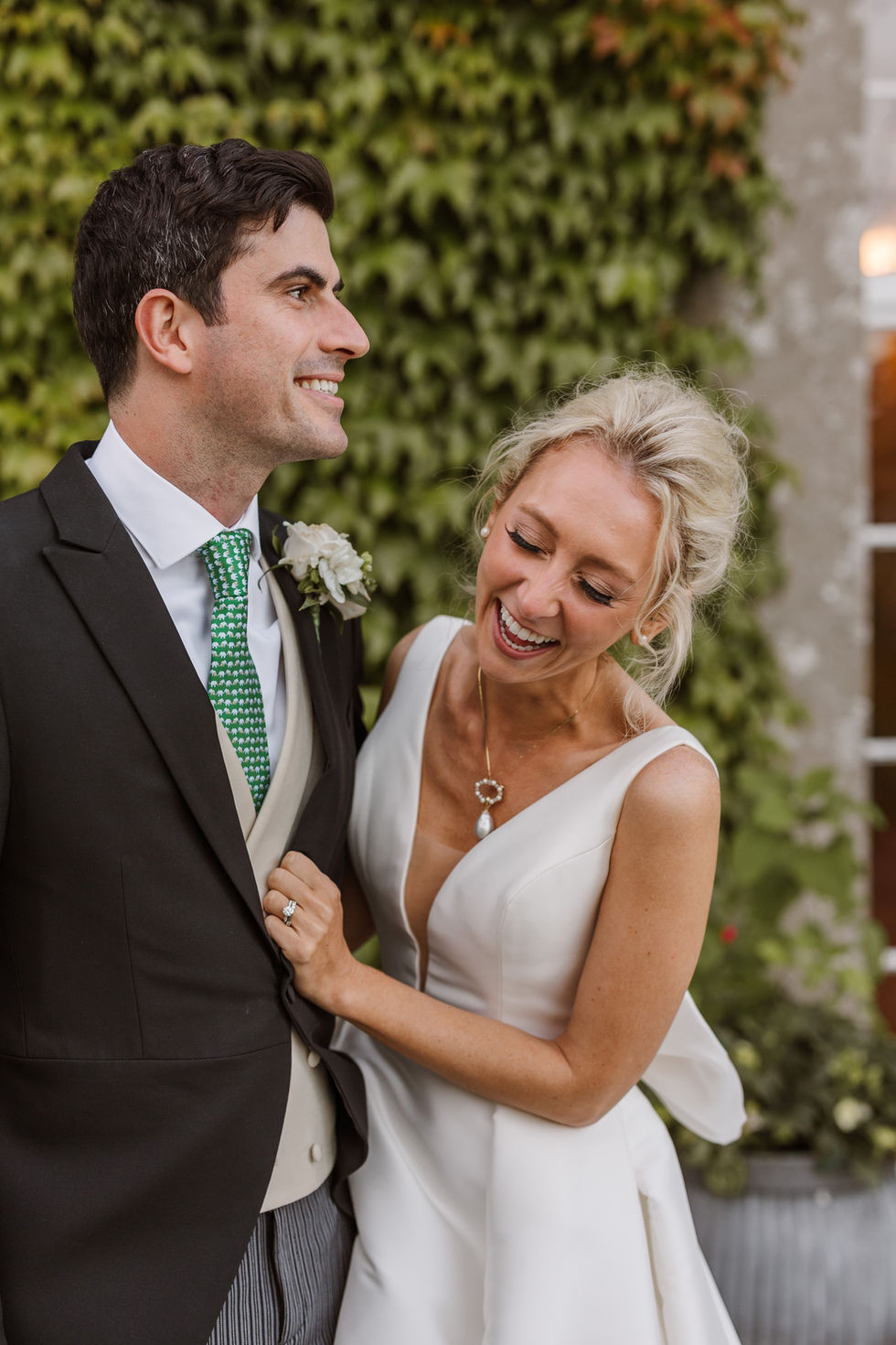 Bride and groom laughing at findon place