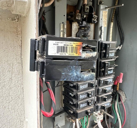 electrician to repair burnt out breaker in Phoenix, AZ.