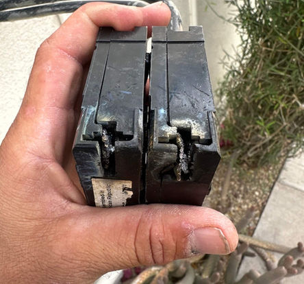 electrician for burnt out breaker in Phoenix, AZ.