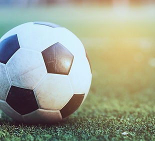 old-football-green-artificial-grass-field-football-soccer-sport-game-competition.jpg