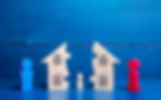 A wooden house split into two halves, symbolising the importance of protecting a mortgage to safeguard your home.