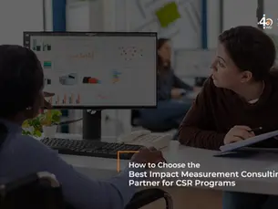 Impact assessment consultant discussing CSR program data with their client