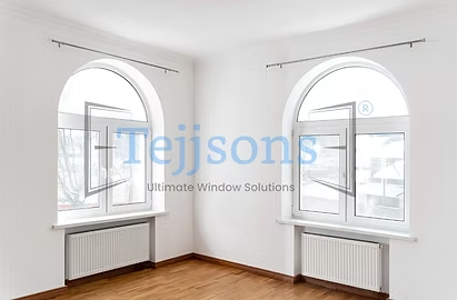 Bright rooms with modern arched aluminium windows with open casement panels