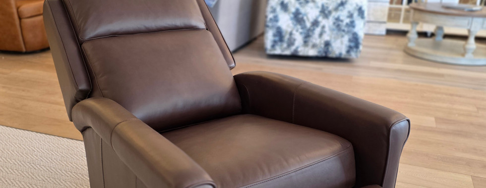 Effortlessly lean back and unwind in premium leather crafted for exceptional durability.