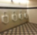 BEFORE: Warehouse restroom urinals