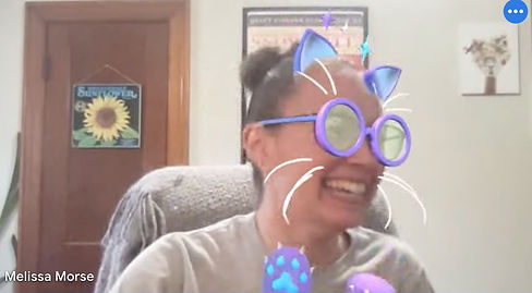 Melissa on a Zoom call using a filter with cat whiskers and glasses
