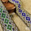 Thumbnail: 50 mm geometric jacquard ribbon with metallic gold thread in emerald green or royal blue colourways. Decorative woven trim.