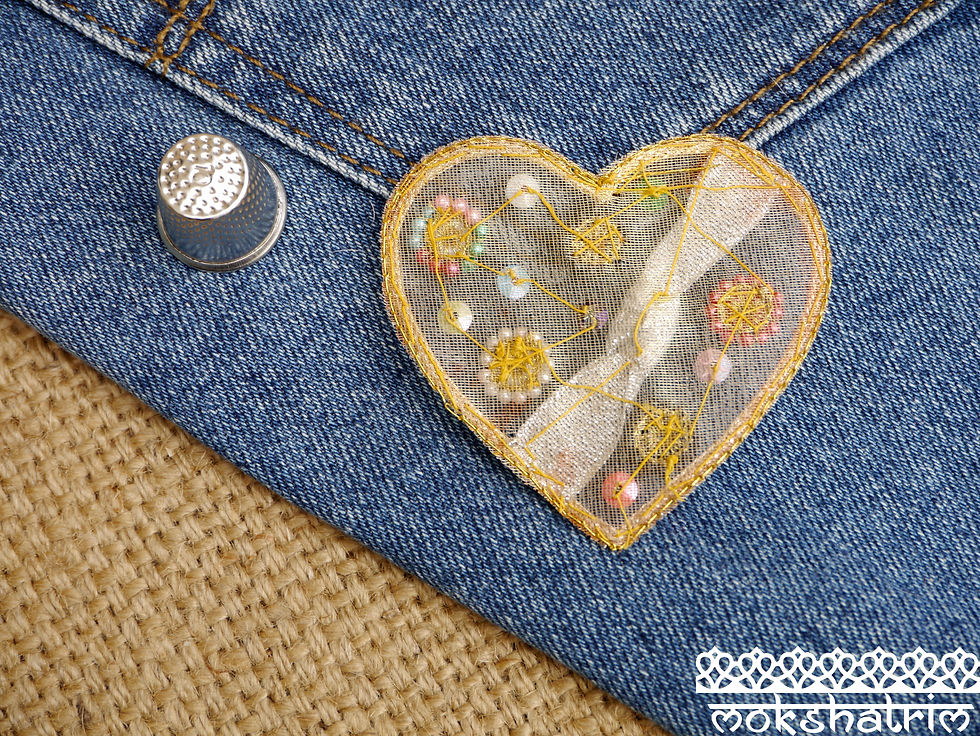 Thumbnail: Gold Tulle applique heart embroidered gold silver metal, black, red, pink, green, yellow & white beads Mokshatrim Haberdasher