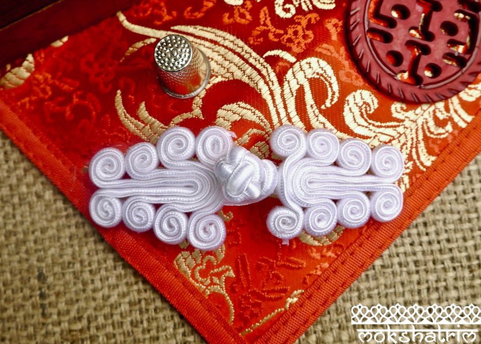 Thumbnail: white long coil monkey knot frog chinese oriental trim applique fastener haberdashery mokshatrim