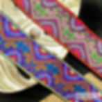 Tibetan ethnic decorative jacquard ribbon with geometric patterns and featuring traditional horn and sunrise motif Mokshatrim