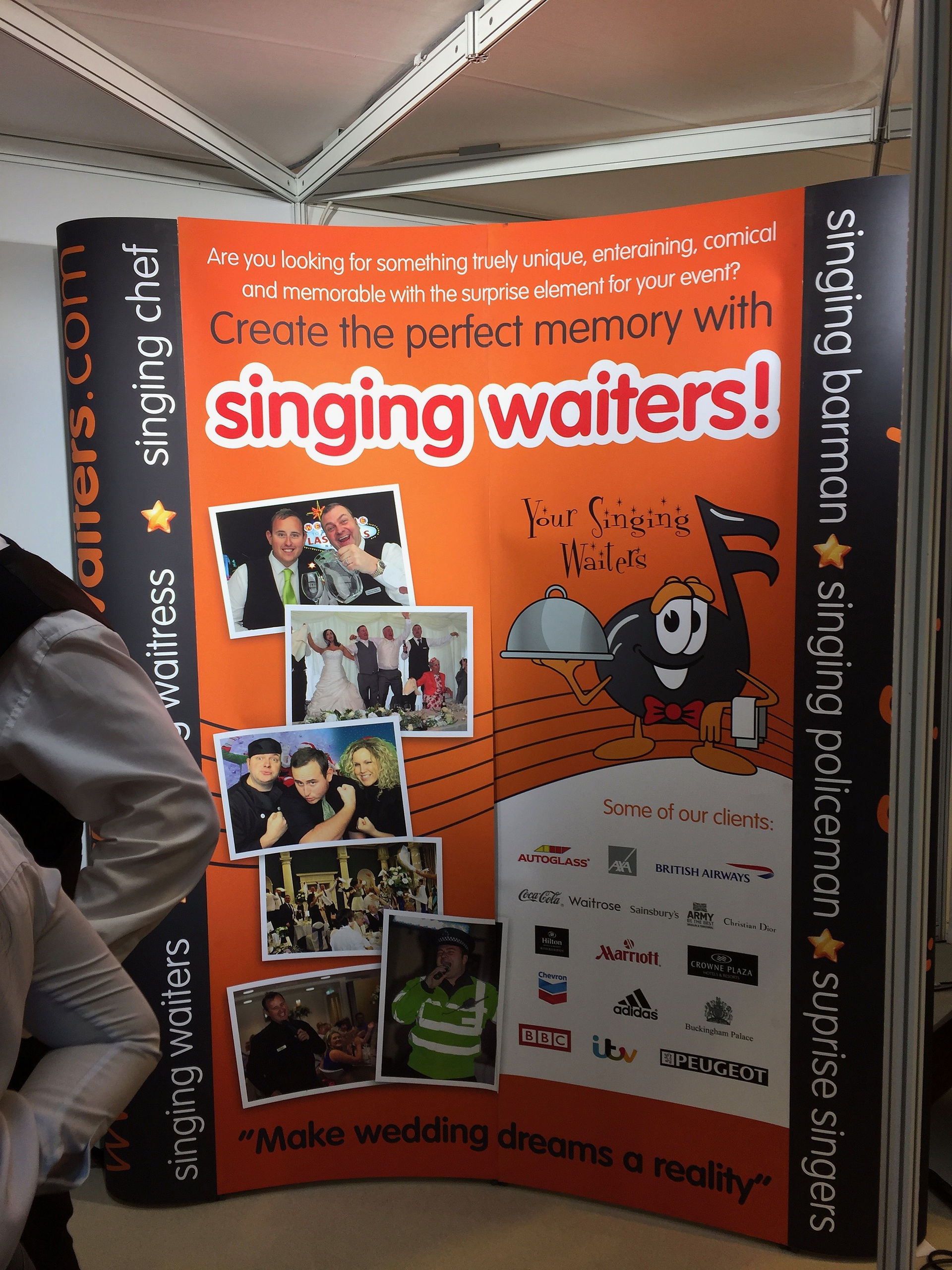 The singing waiters were getting A LOT of female attention