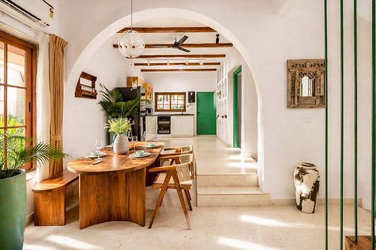 Sunlit Mediterranean-Scandi dining space.png